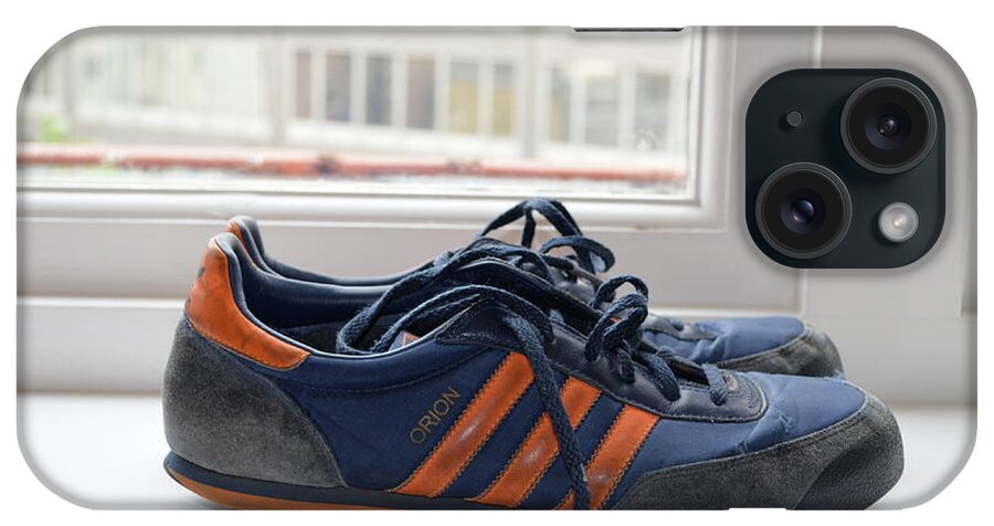 Adidas iPhone Case featuring the photograph Shoes in the Window by Erik Burg
