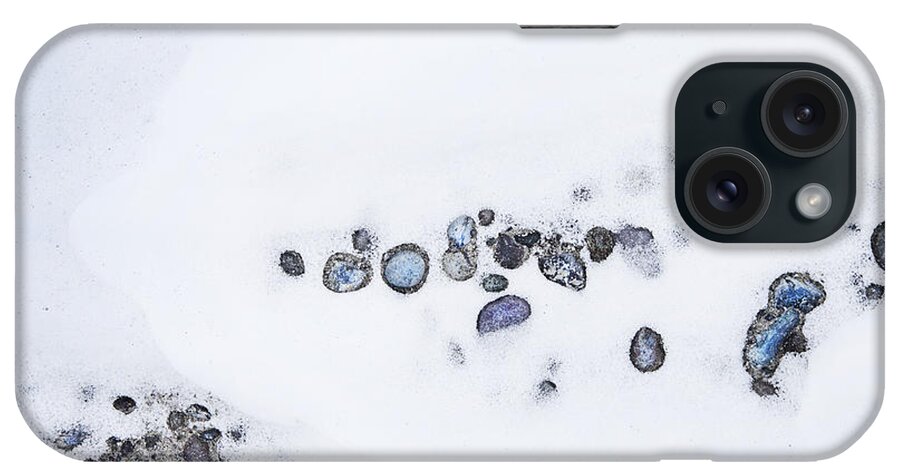 Theresa Tahara iPhone Case featuring the photograph Snow Pebbles Left by Theresa Tahara