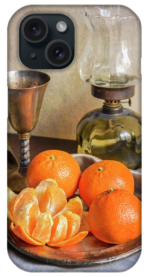 Still Life iPhone Case featuring the photograph Still life with oil lamp and fresh tangerines by Jaroslaw Blaminsky