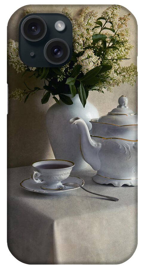 Still Life iPhone Case featuring the photograph Still life with white tea set and bouquet of white flowers by Jaroslaw Blaminsky