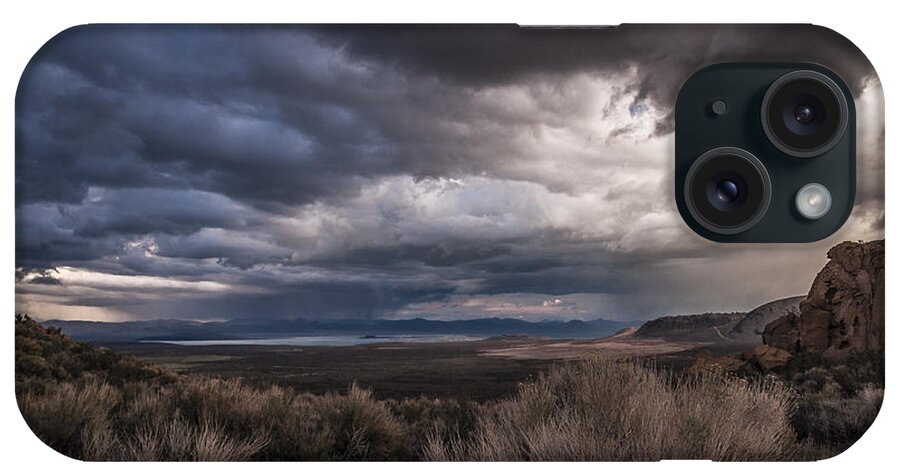 Stormy #california #mono Lake #adventure #clouds #cloudy #cloudy Day #desert #lake #landscape #mountains #nature #scenic #travel #water iPhone Case featuring the photograph Stormy Day by Cat Connor