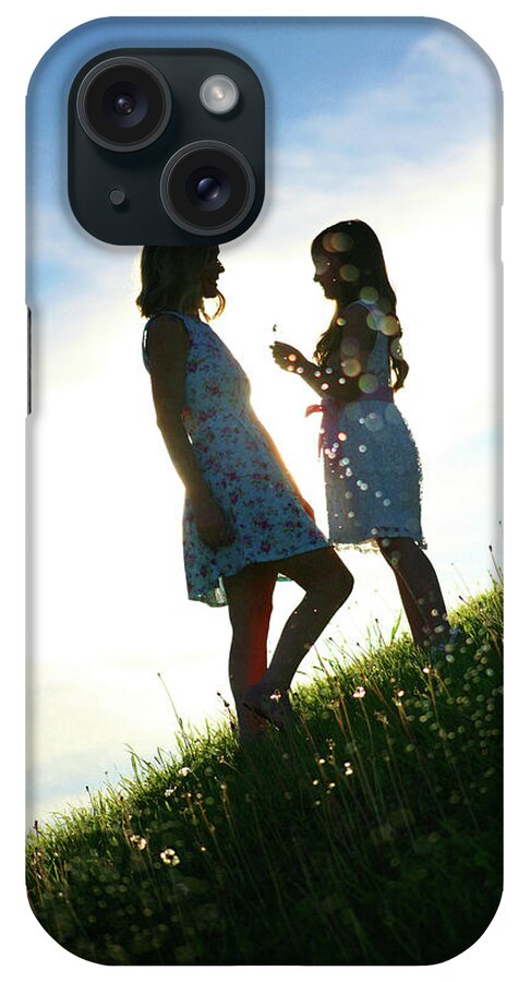 Child iPhone Case featuring the photograph The Gift by Charles Benavidez