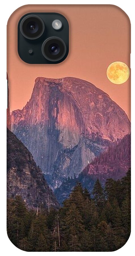 The Moon Hangs iPhone Case featuring the photograph The moon hangs low by Andy Bucaille