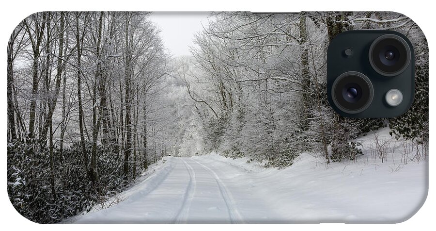 Snow iPhone Case featuring the photograph Tire Tracks In Fresh Snow by D K Wall