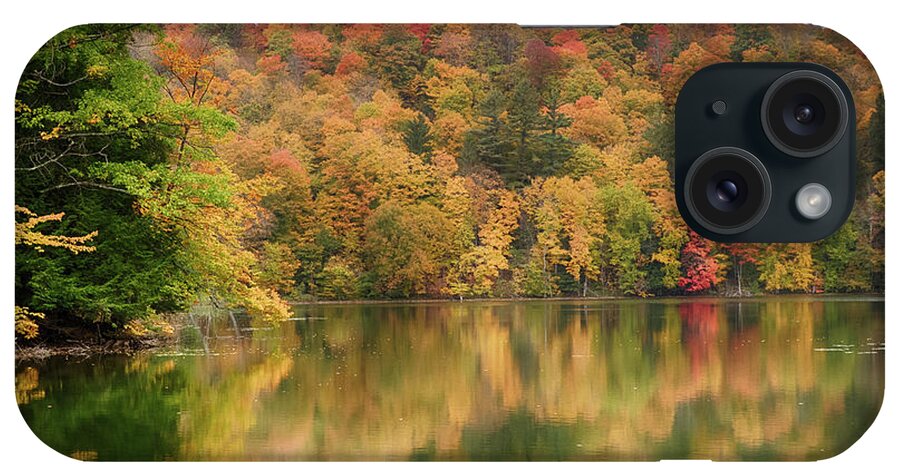Abenaki iPhone Case featuring the photograph Vermont fall foliage reflected on Pogue Pond by Jeff Folger