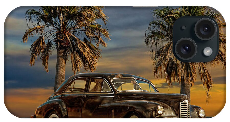 Auto iPhone Case featuring the photograph Vintage Classic Automobile with Palm Trees at Sunrise by Randall Nyhof