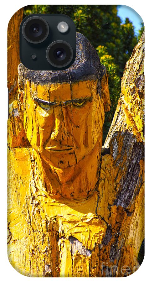 Wood iPhone Case featuring the photograph Wood sculpture in a garden by Eva-Maria Di Bella