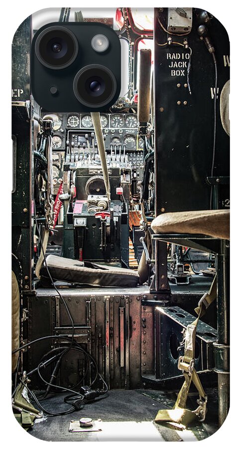 This Is A Photograph Of The Cockpit Of A World War Ii Era Bomber From The United States. It Is Shot From Inside The Fuselage. iPhone Case featuring the photograph WWII B-24J Liberator Bomber Cockpit by Artful Imagery