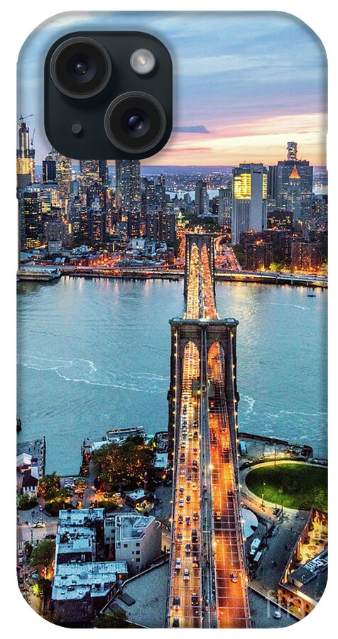 Brooklyn Bridge iPhone Case featuring the photograph Aerial of New York city and Brooklyn bridge at dusk #1 by Matteo Colombo