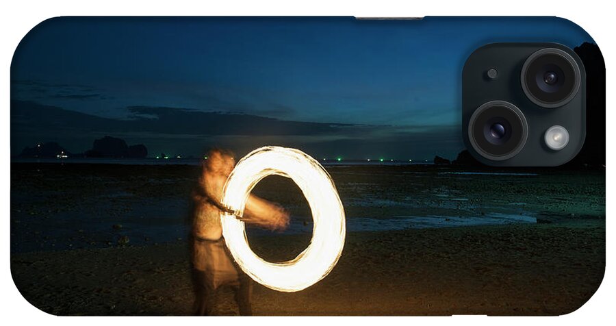 Fire Dancer iPhone Case featuring the photograph Fire Dancer Performing On The Beach In Railay #1 by Cavan Images