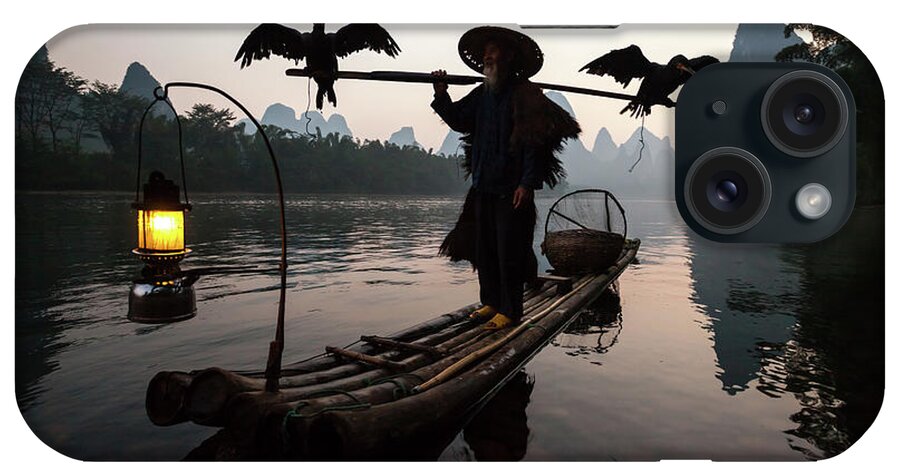 Chinese Culture iPhone Case featuring the photograph Fisherman With Cormorants On Li River #1 by Matteo Colombo
