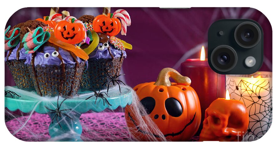 Halloween iPhone Case featuring the photograph Halloween candyland drip cake style cupcakes in party table setting. #1 by Milleflore Images