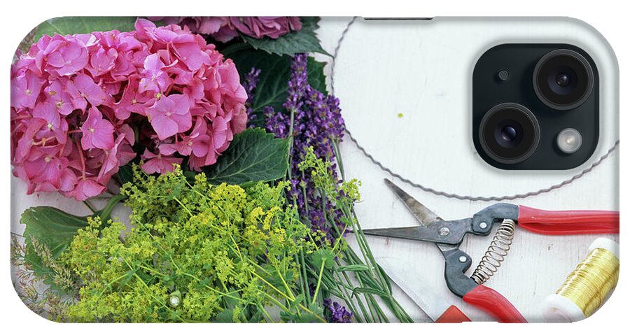 Ip_12139205 iPhone Case featuring the photograph Hydrangea Wreath With Lady's Mantle And Lavender #1 by Friedrich Strauss