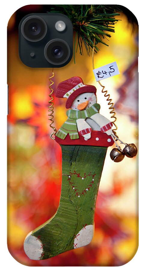 Christmas Stocking And Snowman Ornament At Christmas Market iPhone Case featuring the photograph 1161-4095 by Robert Harding Picture Library