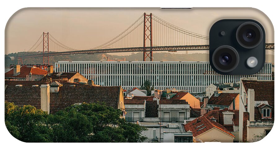 Bridge iPhone Case featuring the photograph 25 De Abril Bridge In Lisbon, Portugal, Cityscape During Golden Hour by Cavan Images