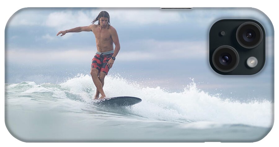 Surf iPhone Case featuring the photograph Surfing The Sunrise In Costa Rica #44 by Cavan Images