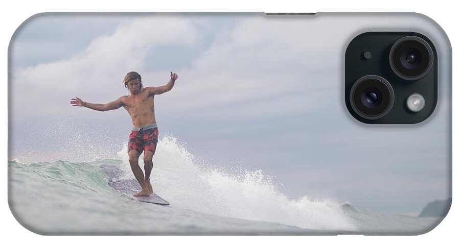Surf iPhone Case featuring the photograph Surfing The Sunrise In Costa Rica #56 by Cavan Images