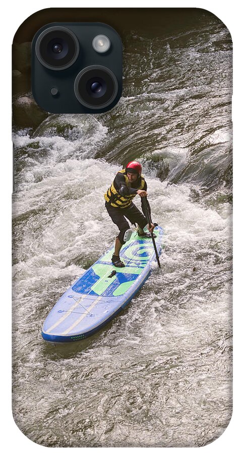 River iPhone Case featuring the photograph Young Man On The Sup Board At River #6 by Cavan Images