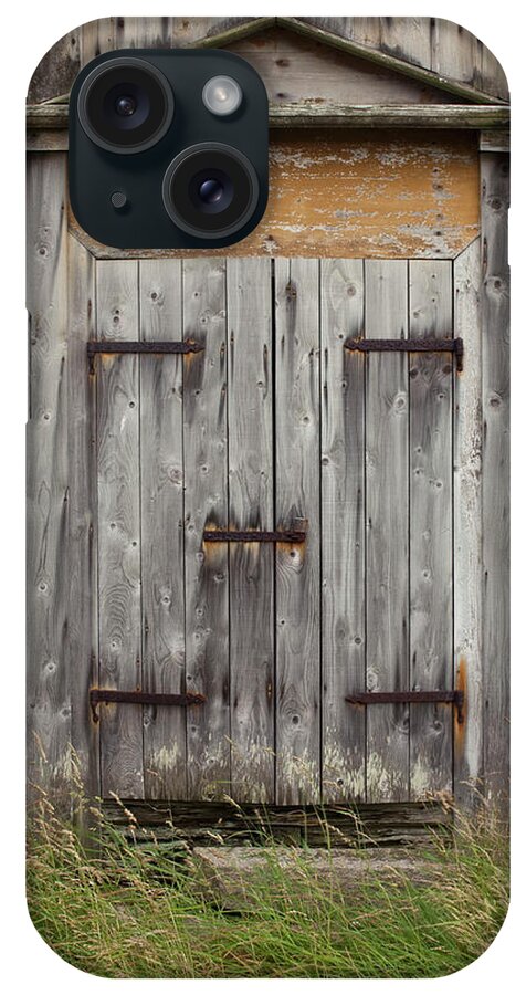 Gotland iPhone Case featuring the photograph A Wooden Door by Benne Ochs