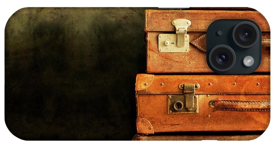 Antique Luggage Suitcases iPhone Case featuring the photograph Antique Luggage Suitcases by Tom Quartermaine