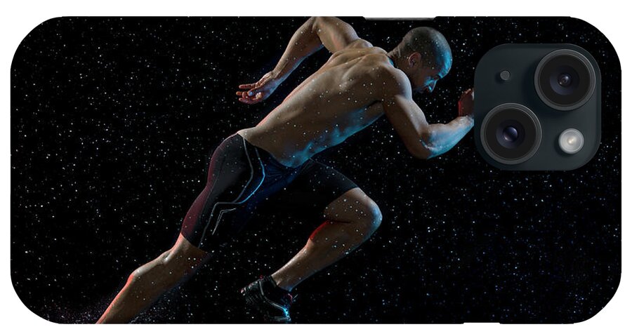 People iPhone Case featuring the photograph Athlete Runner Running Through Rain by Jonathan Knowles