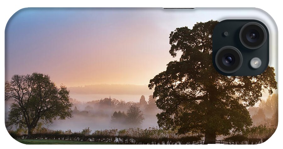 Lower Slaughter iPhone Case featuring the photograph Autumn Mist and Fog Over Lower Slaughter by Tim Gainey