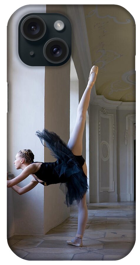 Expertise iPhone Case featuring the photograph Ballerina Doing Exercise By Window by Kathrin Ziegler