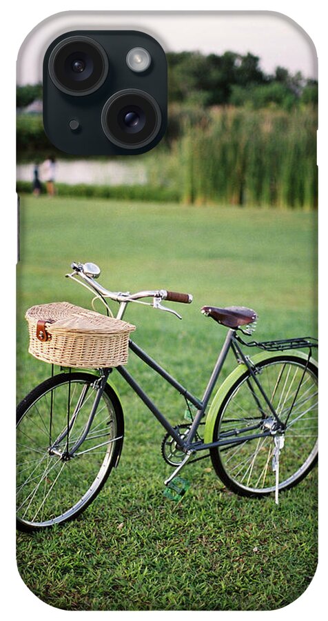 Grass iPhone Case featuring the photograph Bicycle At The Park by Genkigenki