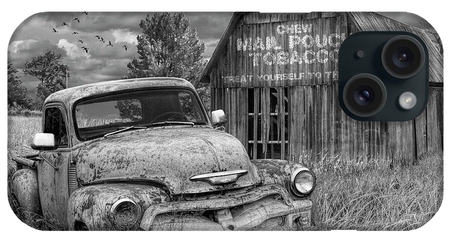 Chevy iPhone Case featuring the photograph Black and White of Rusted Chevy Pickup Truck in a Rural Landscape by a Mail Pouch Tobacco Barn by Randall Nyhof