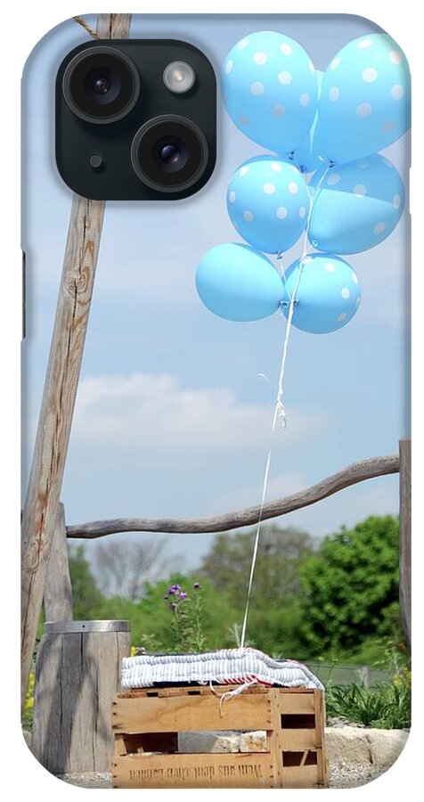 Ip_11143903 iPhone Case featuring the photograph Blue Balloons With White Polka Dots Ties To Wooden Crate by Alexandra Feitsch