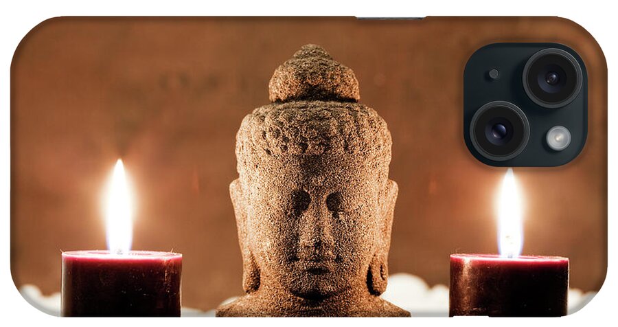 Statue iPhone Case featuring the photograph Buddha Statue And Candles by Aluxum