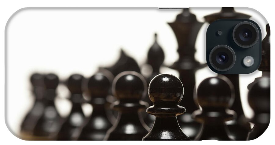 White Background iPhone Case featuring the photograph Close Up Of Chess Pieces On Board by Walter Zerla