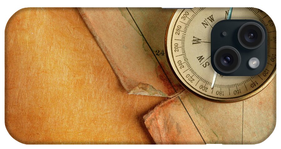 East iPhone Case featuring the photograph Compass On Old Map by Dny59