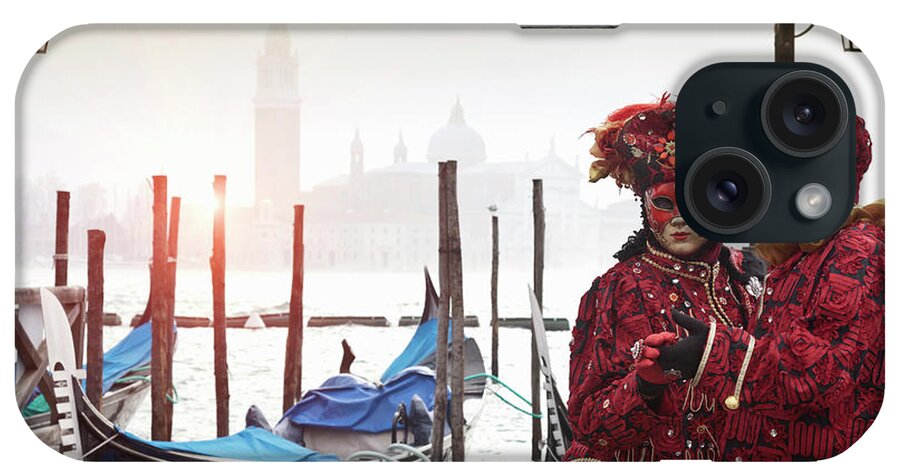 Heterosexual Couple iPhone Case featuring the photograph Costumed Figures At Venice Carnival by Cultura Rm Exclusive/walter Zerla
