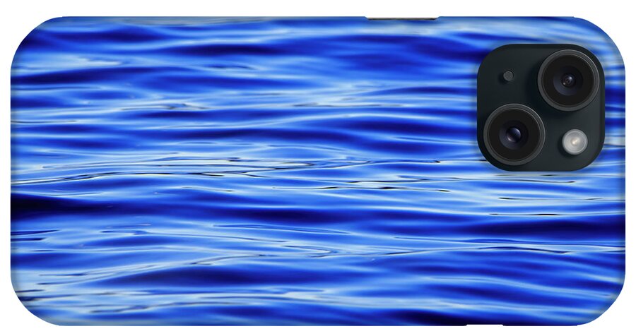 Blue iPhone Case featuring the photograph Dark Blue Water Ripples Background by Sandra J's