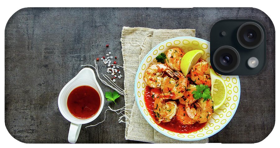 Ip_12551225 iPhone Case featuring the photograph Delicious Grilled Pink Prawn Shrimp With Lemons And Sauce by Yuliya Gontar