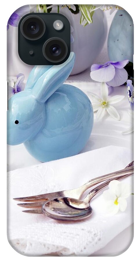 Ip_11215545 iPhone Case featuring the photograph Easter Table Decoration With China Rabbit, Flowers & China Egg by Angelica Linnhoff