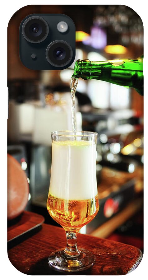 Alcohol iPhone Case featuring the photograph Filling A Beer Glass On The Bar Counter by Gm Stock Films