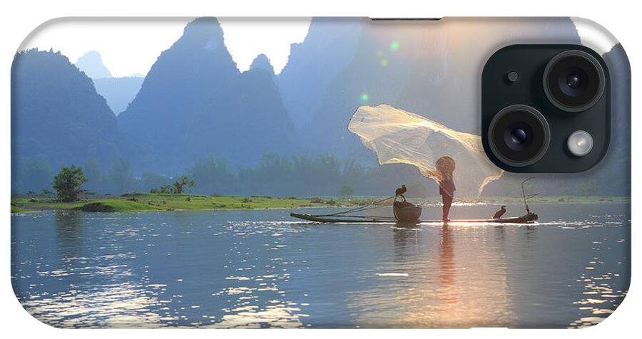 Scenics iPhone Case featuring the photograph Fishing On The Li River by Bihaibo