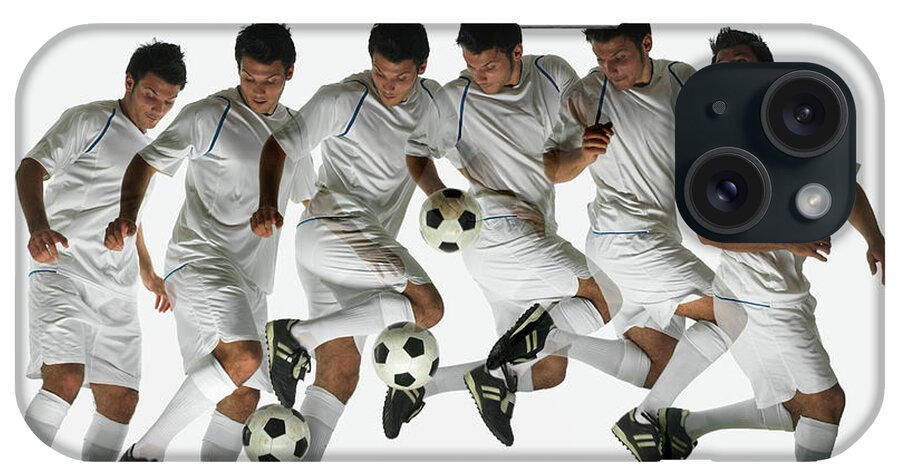 Young Men iPhone Case featuring the photograph Footballer Performing Ball Flick by John Lamb