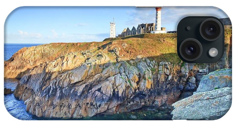 Estock iPhone Case featuring the digital art France, Brittany, Atlantic Ocean, Finistere, Brest, Brest Harbor, View Of The Saint Mathieu Lighthouse And Abbey, Near Le Conquet Village by Luigi Vaccarella