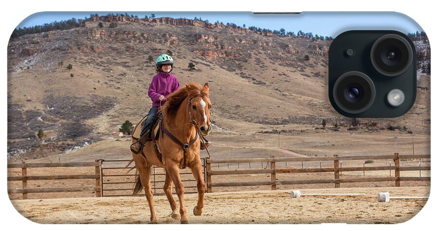 Blue Sky iPhone Case featuring the photograph Girl Practicing Horseback Riding In Outdoor Arena by Cavan Images