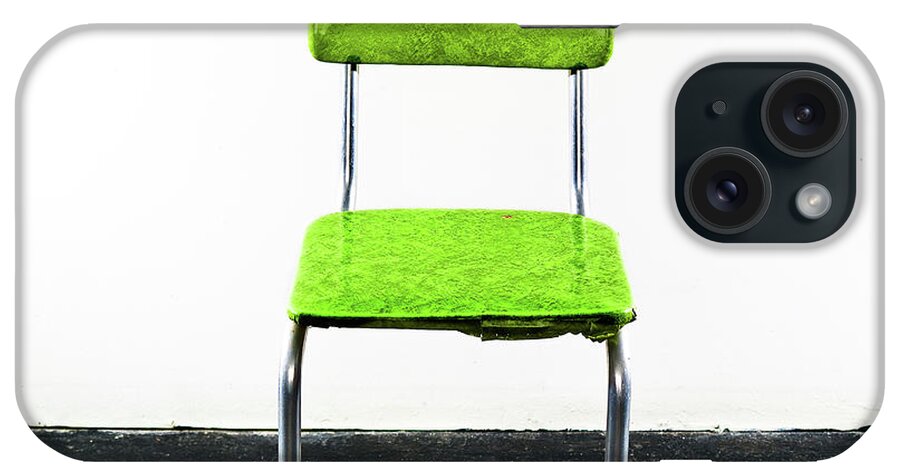 Single Object iPhone Case featuring the photograph Green Chair On A Black Floor by Jay B Sauceda
