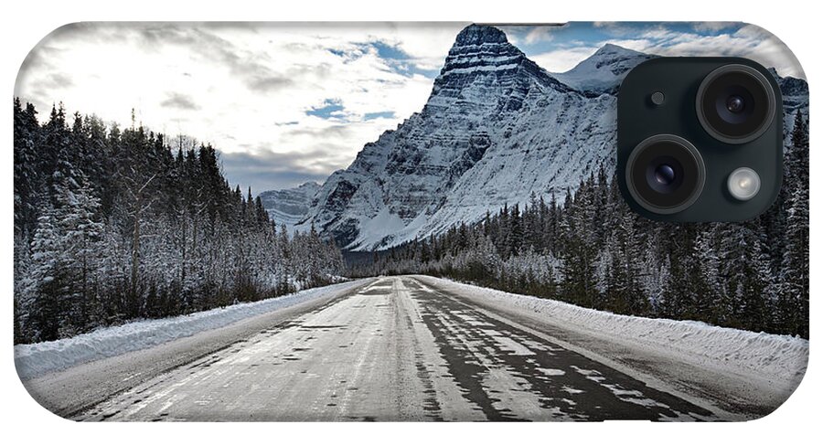 Scenics iPhone Case featuring the photograph Ice Covered Highway Leads Towards by Aaron Black