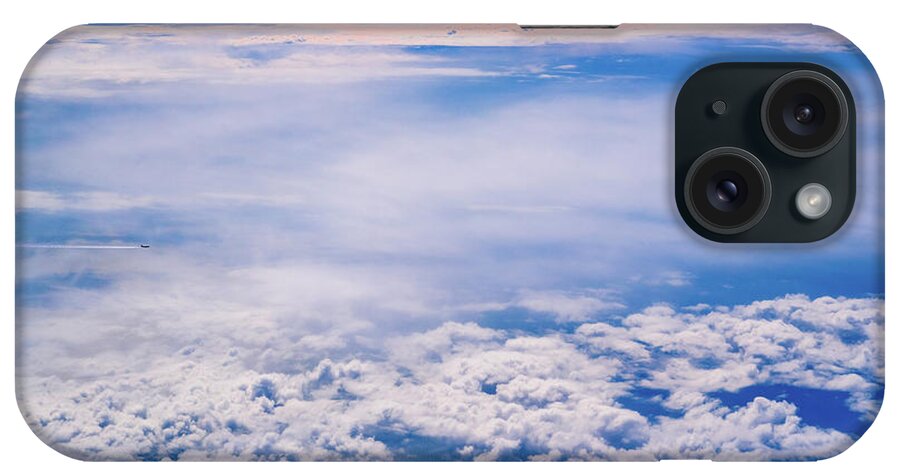 Across iPhone Case featuring the photograph Intense blue sky with white clouds and plane crossing it, seen from above in another plane. by Joaquin Corbalan