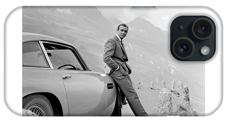 #faatoppicks iPhone Case featuring the photograph James Bond Coolly Leaning on His Aston Martin by Doc Braham