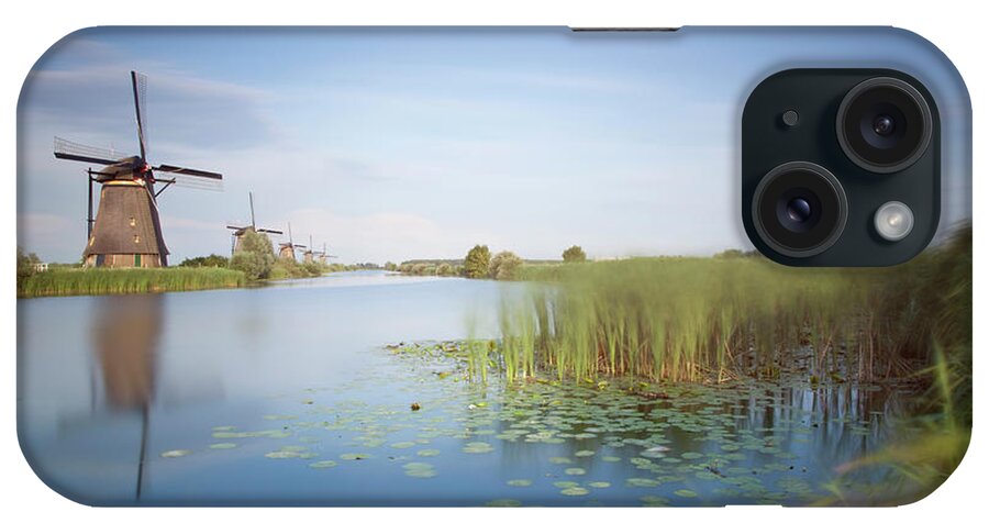 Tranquility iPhone Case featuring the photograph Landscape With Windmills, Kinderdijk by Frank De Luyck