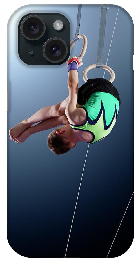 Hanging iPhone Case featuring the photograph Male Gymnast Performing Somersault On by Robert Decelis Ltd
