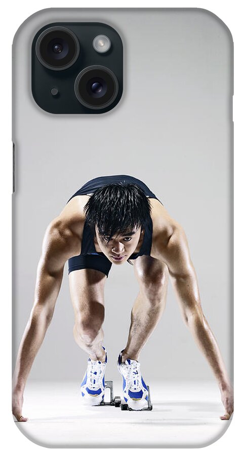 People iPhone Case featuring the photograph Male Runner In Starting Blocks by Ting Hoo