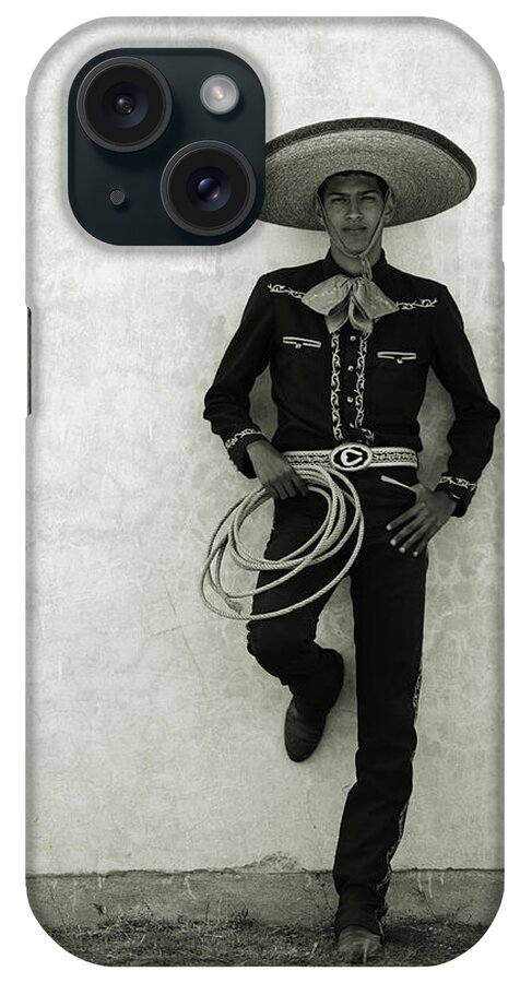 Cool Attitude iPhone Case featuring the photograph Mexican Cowboy Wearing Hat And Holding by Terry Vine